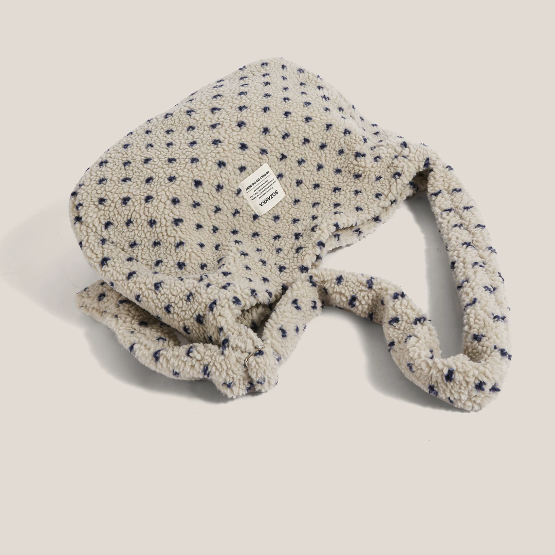Vera | Bolso de mano texturizado con estampado