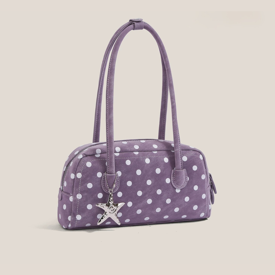 Bolso bandolera de lunares con detalle de estrella