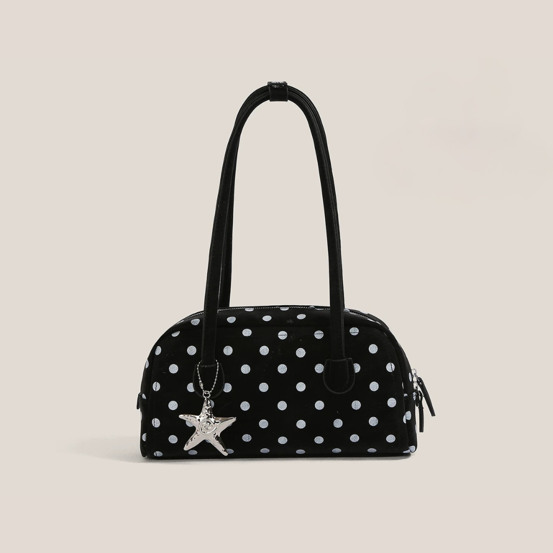 Bolso bandolera de lunares con detalle de estrella
