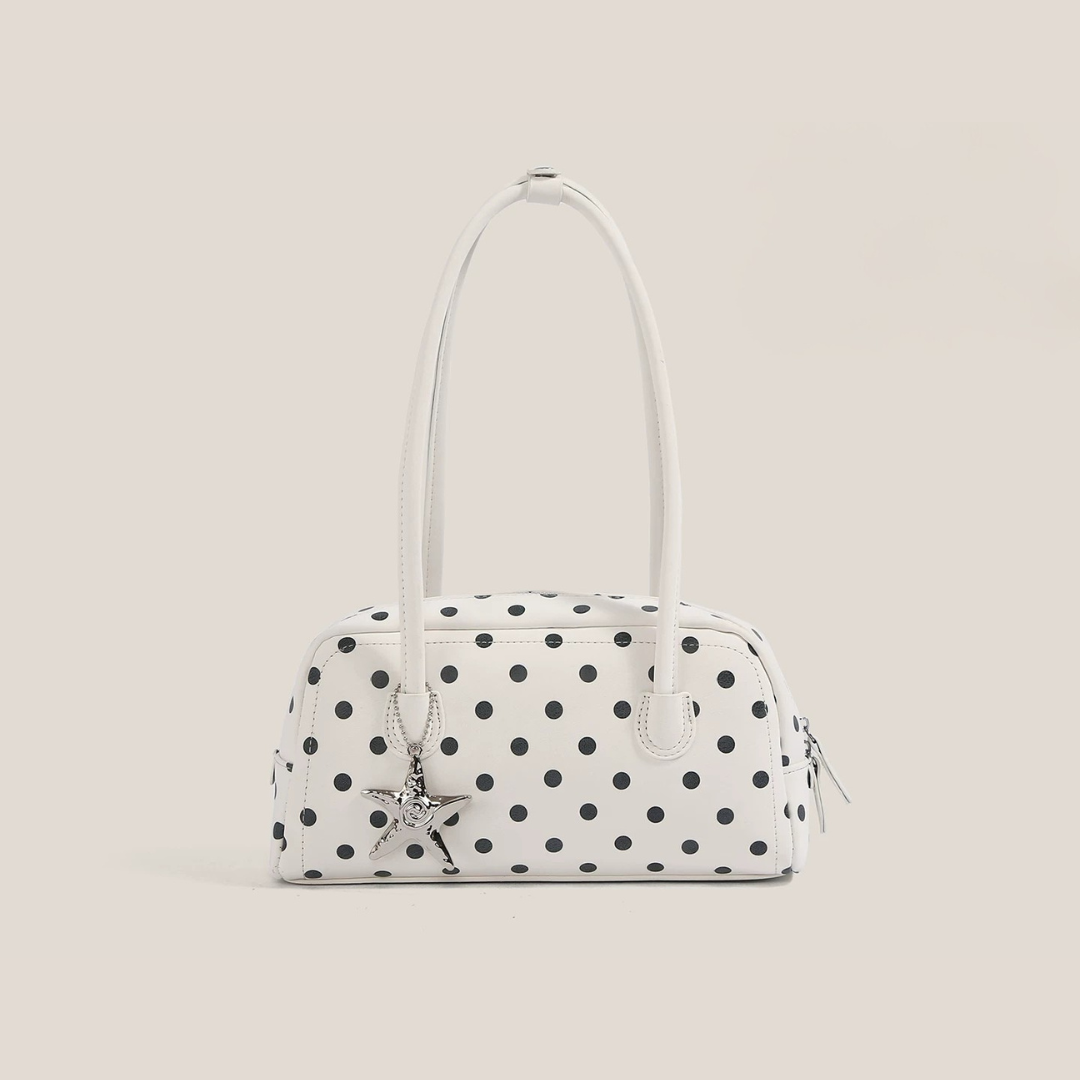 Bolso bandolera de lunares con detalle de estrella