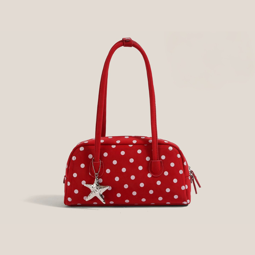 Bolso bandolera de lunares con detalle de estrella
