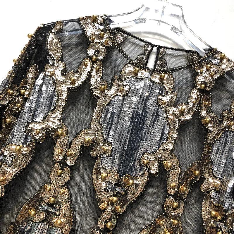 Beatriz | Blusa de lentejuelas dorada y negra