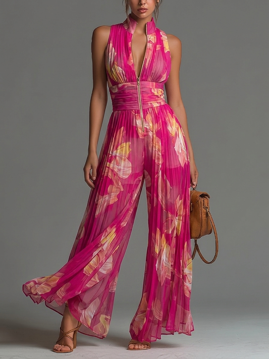 Mono Fucsia en Chifón con Estampado Floral, Sin Mangas, Cremallera y Pierna Ancha Plisada